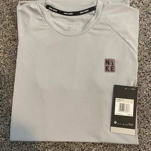 Brand new Nike dri fit shirt size XS